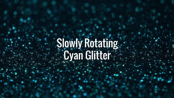 Seamlessly looping spinning shiny blue glitter particles on dark surface.