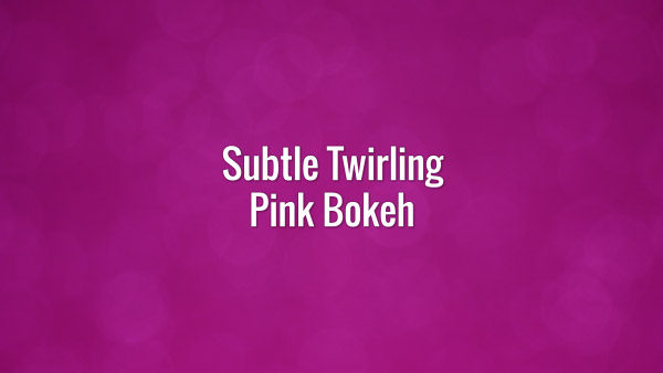Seamlessly looping spinning pink bokeh particles.